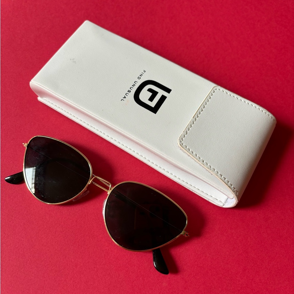Find Unusual Black and Gold Sunglasses
